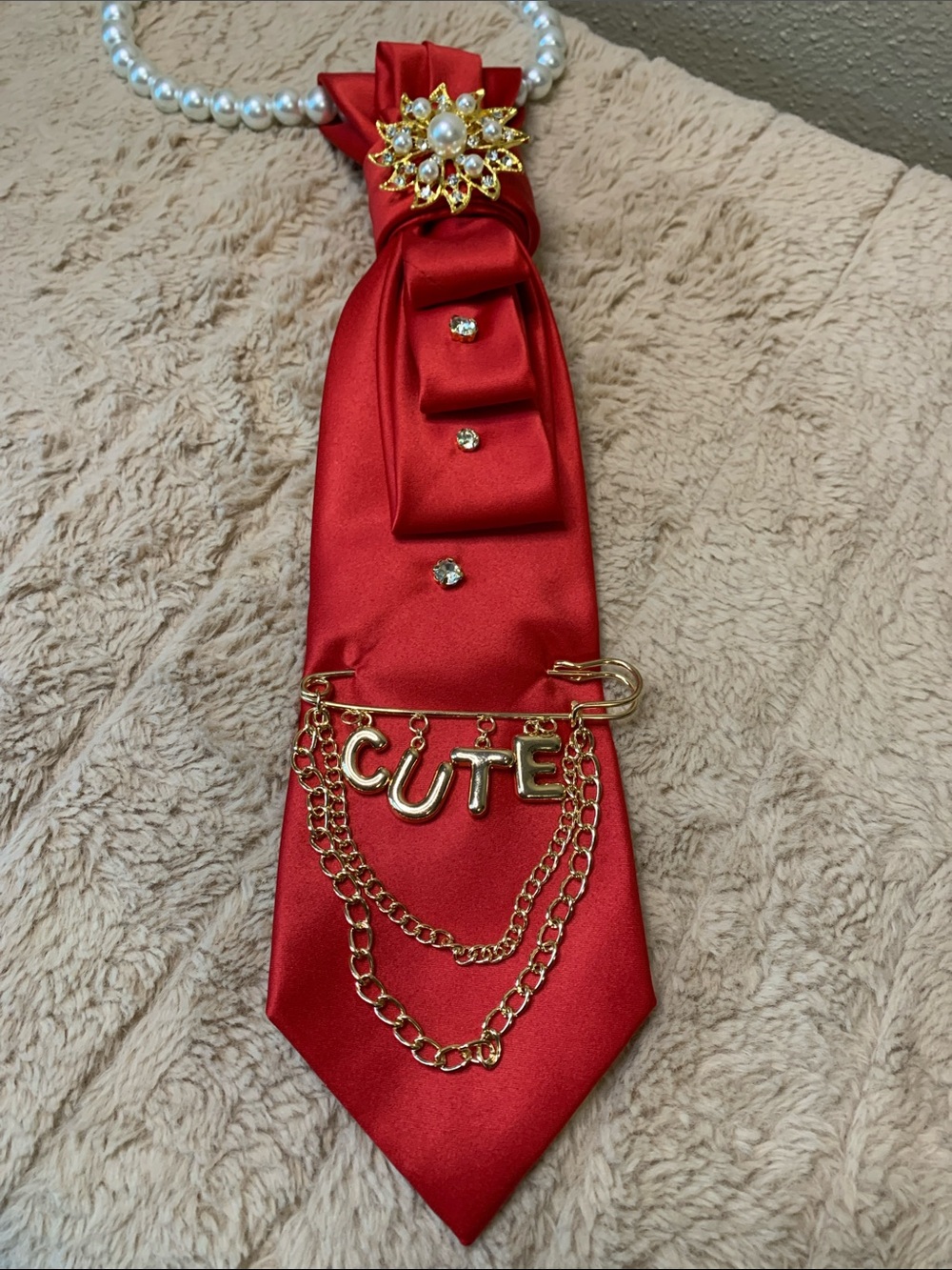 Red Satin Handcrafted Statement Tie-Necklace with Gold 'CUTE' Charm